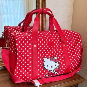 NWOT Hello Kitty Red Polka Dot Duffel Bag.  Approx 19 1/2” w x 15”h x 9”d.
